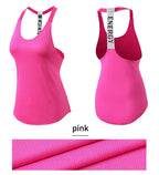 Black sleeveless yoga top for women by MANDOTOS INTERNATIONAL, backless fitness shirt, stretchy and comfortable for active wear.