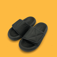 Chic grey beach sandals with comfort sole by MANDOTOS INTERNATIONAL, featuring a stylish design and cushioned footbed.