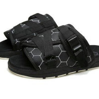 Unisex beach slides by MANDOTOS INTERNATIONAL featuring stylish design and comfortable fit, perfect for casual summer wear.