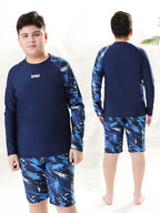 Children's boys' two-piece swim trunks by Mandotos International, sun-protective swimwear for older boys in a hot spring setting.
