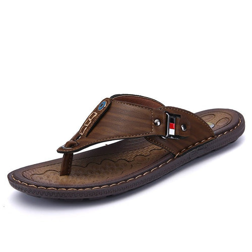 Mandotos International Coastal Trek non-slip sandals with adjustable straps and rugged sole for secure outdoor wear.