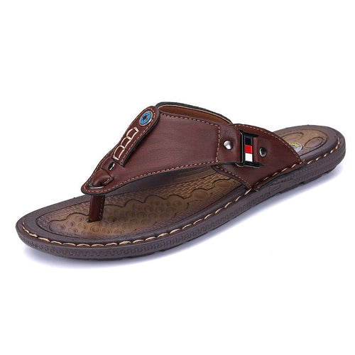 Mandotos International Coastal Trek non-slip sandals with adjustable straps and cushioned soles for comfortable outdoor wear.