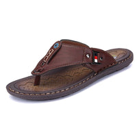Mandotos International Coastal Trek non-slip sandals with adjustable straps and textured soles for secure walking on beach and outdoor surfaces.