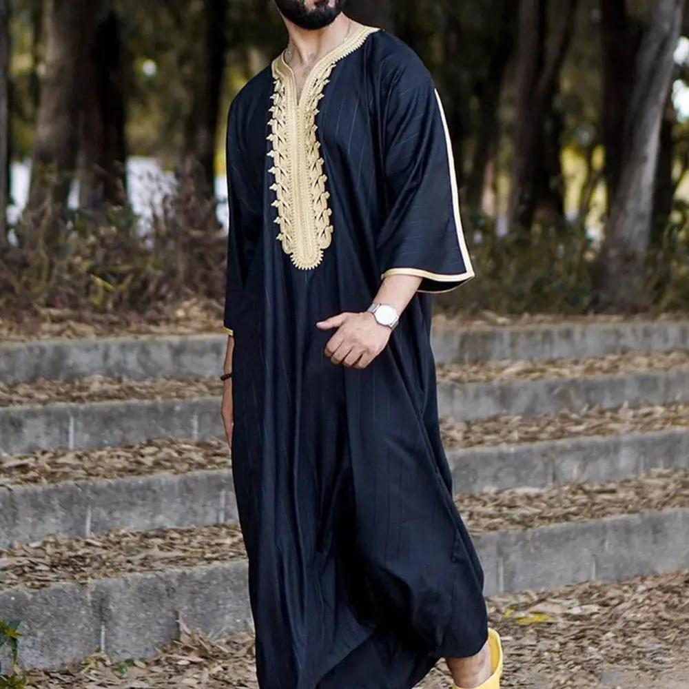 Elegant men's black linen robe by MANDOTOS INTERNATIONAL, shown draped open with a soft, lightweight fabric and tailored fit.