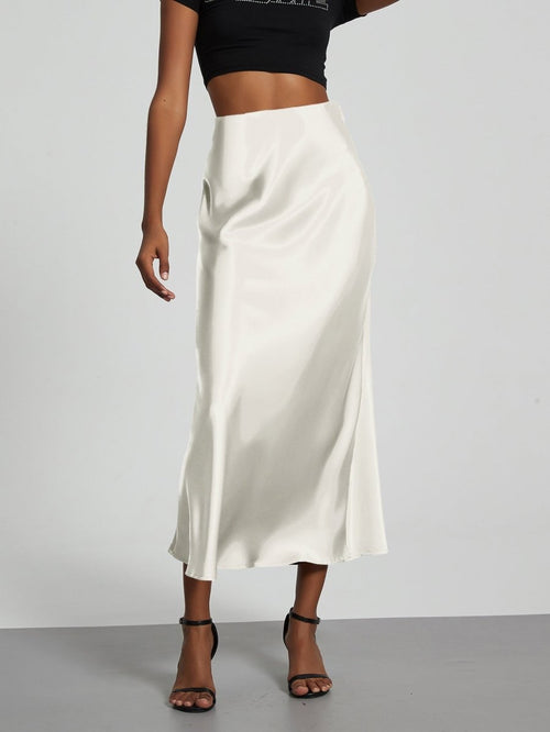 European American style satin midi skirt by MANDOTOS INTERNATIONAL, featuring a smooth, elegant design perfect for stylish outfits.