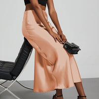 European American style satin midi skirt by Mandotos International, featuring a smooth, elegant fabric and classic midi length.