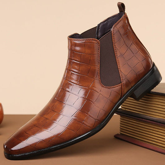Glossy high-top men's Chelsea boots in size 48 by MANDOTOS INTERNATIONAL, showing shiny black leather with elastic side panels.