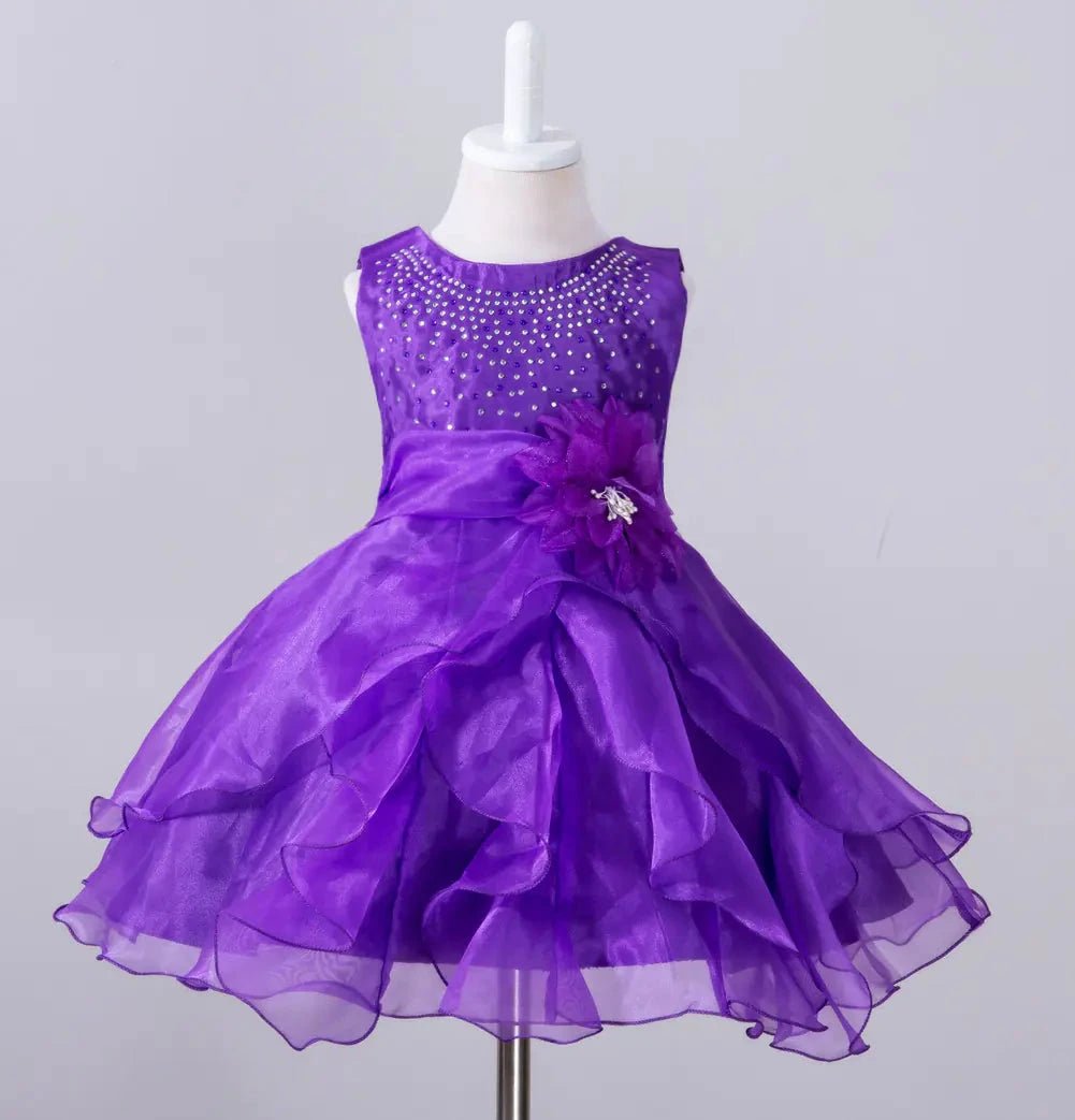 Kids glam dresses and gowns by MANDOTOS INTERNATIONAL, featuring colorful, elegant designs for special occasions.