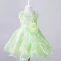 Kids' glam dresses and gowns by MANDOTOS INTERNATIONAL, featuring colorful, stylish designs for special occasions.