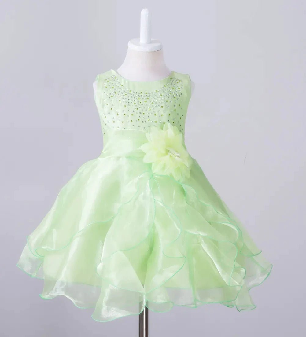Kids glam dresses and gowns by MANDOTOS INTERNATIONAL featuring colorful, stylish designs for special occasions.