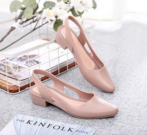 Korean style mid-low heel jelly sandals for women by MANDOTOS INTERNATIONAL, clear and glossy with a comfortable slip-on design.