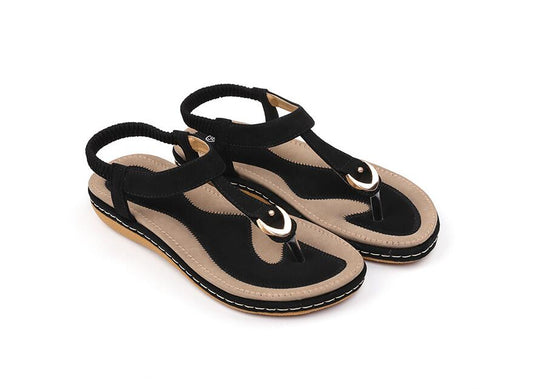 Ladies' chic beach flip flops by MANDOTOS INTERNATIONAL with stylish straps and comfortable soles for summer wear.