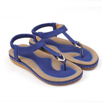 Ladies' chic beach flip flops by MANDOTOS INTERNATIONAL with stylish straps and comfortable sole for summer wear.