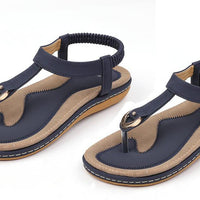 Ladies' chic beach flip flops by MANDOTOS INTERNATIONAL with stylish straps and comfortable soles, perfect for summer.
