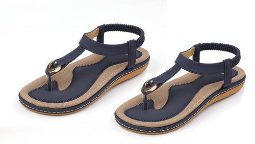 Ladies' chic beach flip flops by MANDOTOS INTERNATIONAL featuring stylish straps and comfortable soles for summer wear.