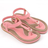 Ladies' chic beach flip flops by MANDOTOS INTERNATIONAL featuring stylish straps and comfortable soles.