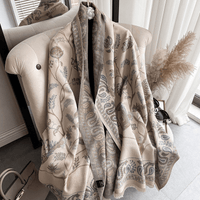 Mandotos International LuxeBreeze UV scarf featuring lightweight fabric with sun protection, stylish design, and vibrant colors.