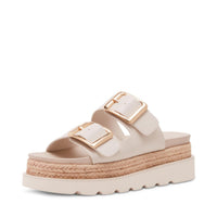 Madden Girl Chic Mythical Flats in bone color, size 6, featuring a stylish slip-on design with a sleek, modern look.