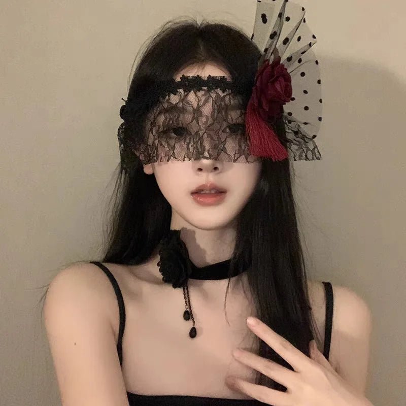 Sexy lace half-face masquerade mask by Mandotos International, gothic style with elegant lace design for fancy dress and Halloween events.