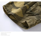 Men's camouflage outdoor stretch tooling shorts by MANDOTOS INTERNATIONAL, featuring a relaxed fit and functional design.