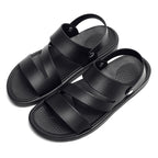 Men's Coastal Walk Sandals by MANDOTOS INTERNATIONAL with tan straps and cushioned sole, ideal for casual summer wear.