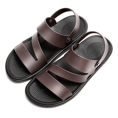 Men's Coastal Walk Sandals by MANDOTOS INTERNATIONAL, featuring brown leather straps and cushioned soles for comfortable summer wear.