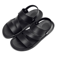 Men's Coastal Walk Sandals by MANDOTOS INTERNATIONAL featuring leather straps and textured soles for casual outdoor wear.