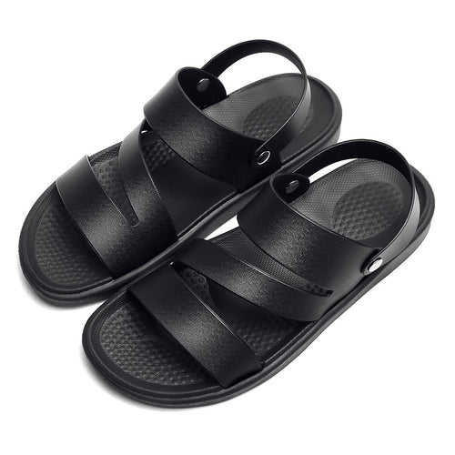 Men's Coastal Walk Sandals by MANDOTOS INTERNATIONAL featuring leather straps and textured soles for casual outdoor wear.
