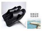Men's non-slip soft-soled beach sandals in beige for summer by MANDOTOS INTERNATIONAL, shown on a sandy beach.