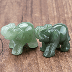 Mini Elephant Crystal Sculpture by MANDOTOS INTERNATIONAL, clear crystal figurine with detailed elephant design on a base.