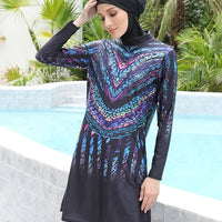 Mandotos International modest Muslim burkini with full coverage, stylish design, and functional swimwear for middle-aged women in navy blue.