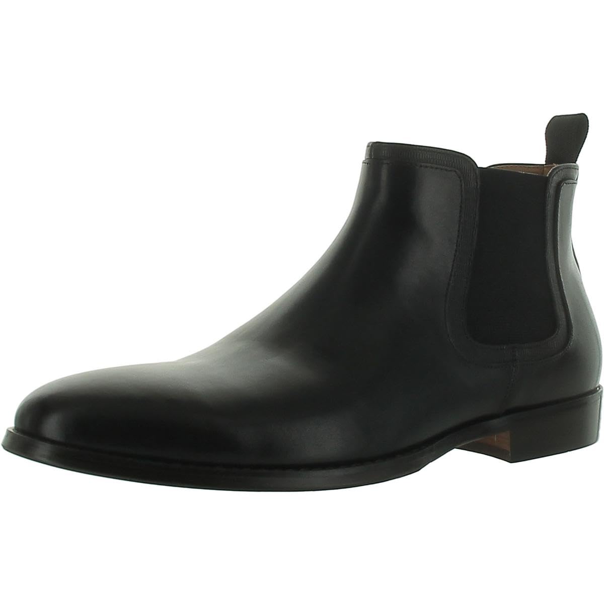 Steve Madden Duke leather Chelsea boots in size 9.5, black with elastic side panels and sleek design.