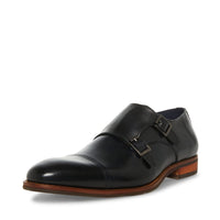 Steve Madden Teon black monk loafer featuring sleek leather design and classic buckle detail for men's dress footwear.