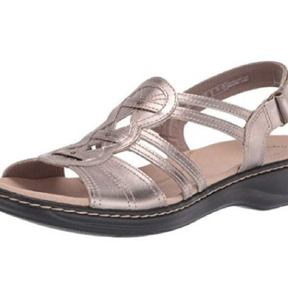 Trendy women's beach sandals by MANDOTOS INTERNATIONAL featuring comfortable straps and stylish design for summer wear.