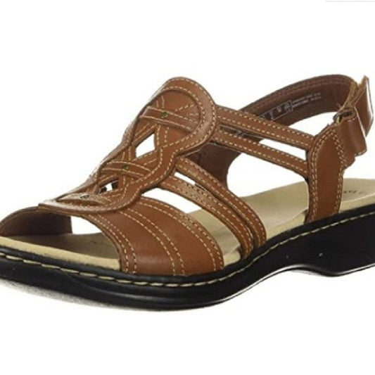 Trendy women's beach sandals by MANDOTOS INTERNATIONAL featuring open-toe design and comfortable straps.