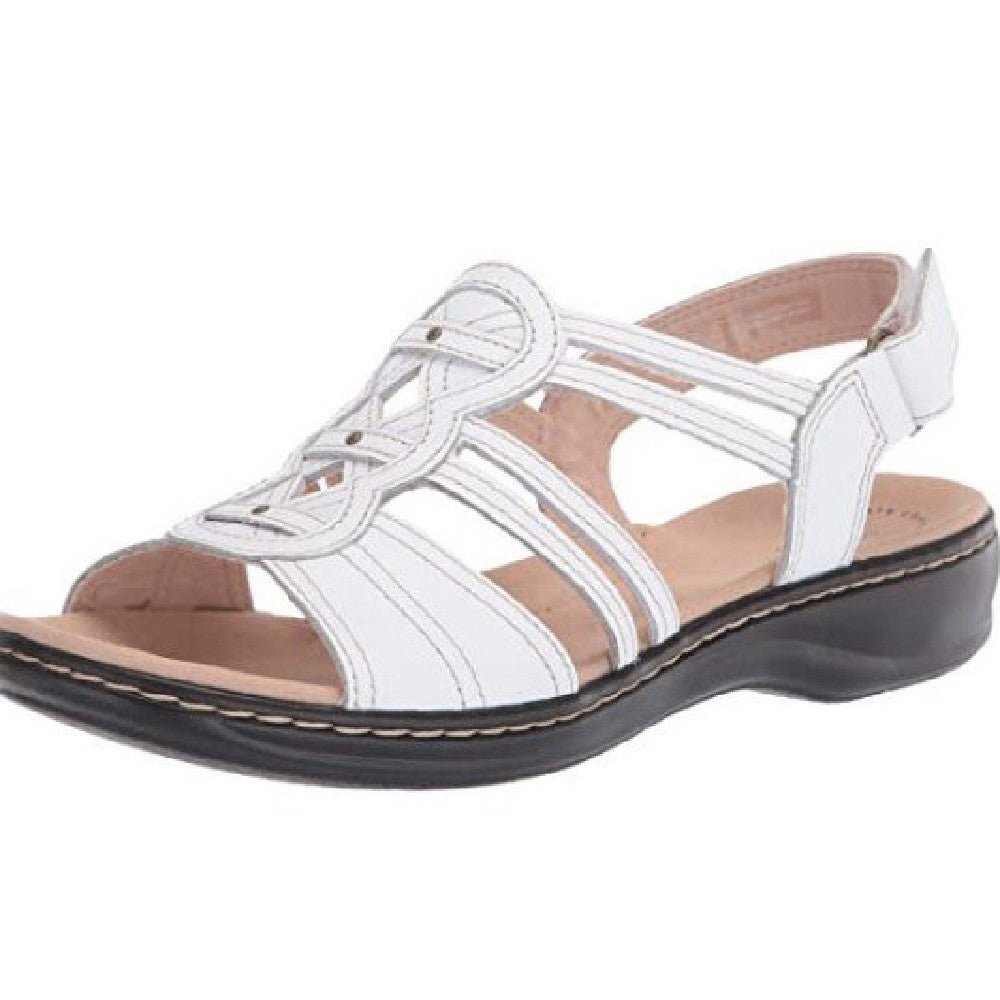 Trendy women's beach sandals by MANDOTOS INTERNATIONAL with colorful straps and casual slip-on design for summer wear.
