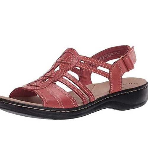 Trendy women's beach sandals by MANDOTOS INTERNATIONAL featuring comfortable straps and stylish design for summer wear.