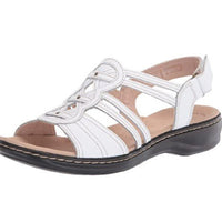 Trendy women's beach sandals by MANDOTOS INTERNATIONAL featuring comfortable straps and stylish design for summer wear.