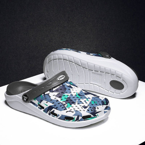 Unisex beach and outdoor slippers by MANDOTOS INTERNATIONAL, featuring comfortable slip-on design and durable sole for casual wear