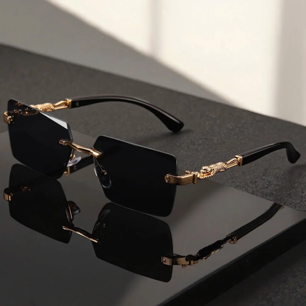 Unisex luxury frameless black and gold sunglasses with leopard print, rectangular lenses, UV400 protection, elegant design.