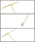 Women's gold body chain necklace bikini jewelry set with four pieces, featuring intricate chains and stylish design by MANDOTOS INTERNATIONAL.