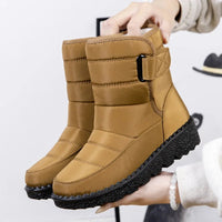 Women's waterproof winter snow boots by MANDOTOS INTERNATIONAL, non-slip ankle boots with warm platform soles.