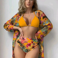 Mandotos International three-piece bikini swimwear set with floral print, including cover-up, designed for ladies beachwear and swim fashion.