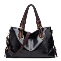 Mandotos Kathie leather tote purse with sturdy handles and spacious interior, showcasing a stylish, high-quality leather design.