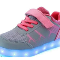 Kids luminous shoes by MANDOTOS with glowing soles and colorful design, perfect for children’s outdoor play and nighttime visibility.