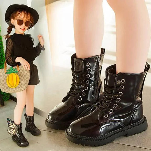 Kids winter shoes by MANDOTOS featuring warm insulation, waterproof design, and colorful winter footwear for children.