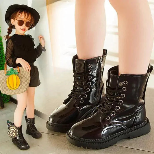 Kids winter shoes by MANDOTOS featuring waterproof boots with warm lining and non-slip soles for cold weather comfort.