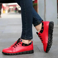Mandotos Korean Student Shoes featuring black and white canvas design with white laces and rubber soles.