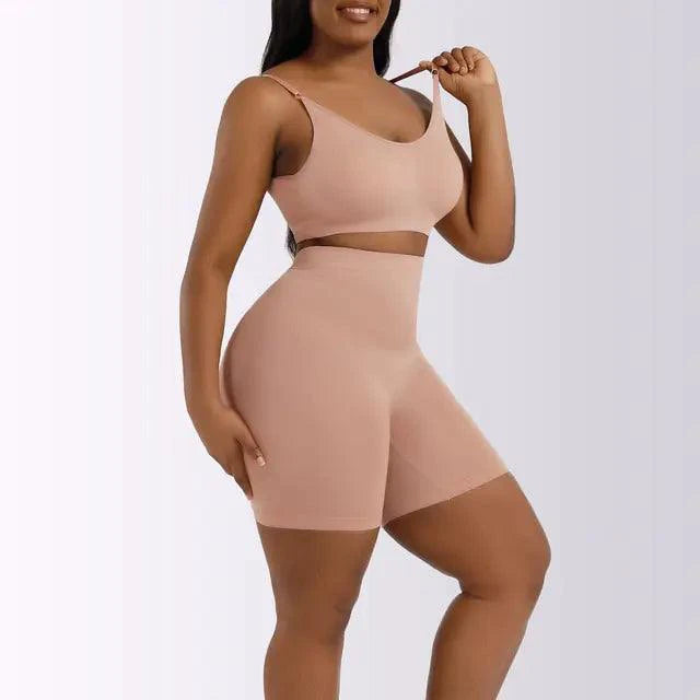 Mandotos ladies' curve-enhancing shaper bodysuit shown on a model, highlighting smooth waist and slimming silhouette.