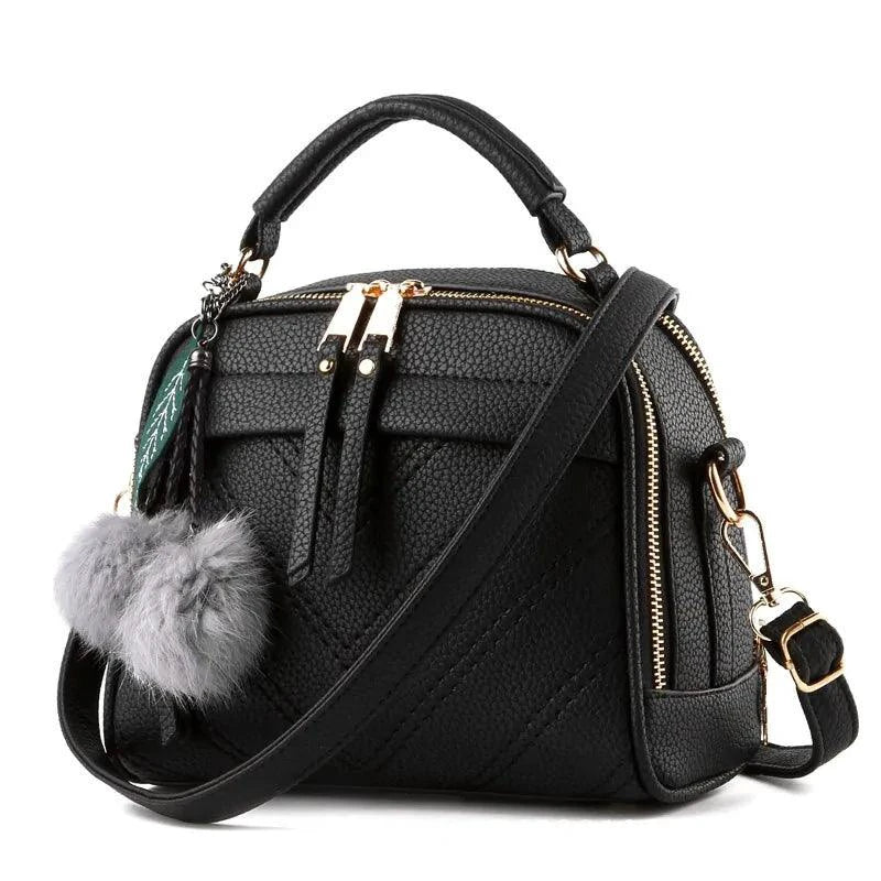 Elegant ladies' luxury leather handbag by MANDOTOS with sleek design and high-quality craftsmanship.